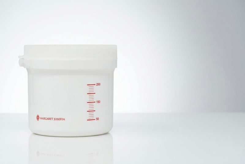 Margaret Josefin Deep Hair Mask tub with measurement markings — a marine collagen treatment for dry, damaged hair at Kija Hair Salon